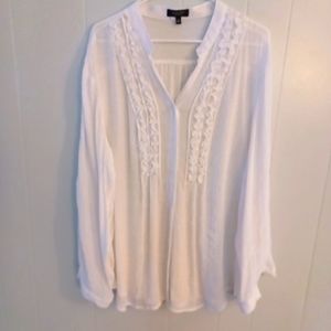 White ruffled blouse